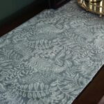 American floral table runner close-up, vintage botanical pattern in light coffee tone
