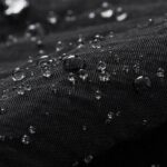 Waterproof Split Server Apron fabric close-up shot, lotus leaf water repellent taffeta texture lightweight cool touch PFAS-free restaurant server apron