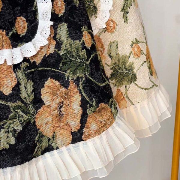 close-up of floral half apron lace trim and print