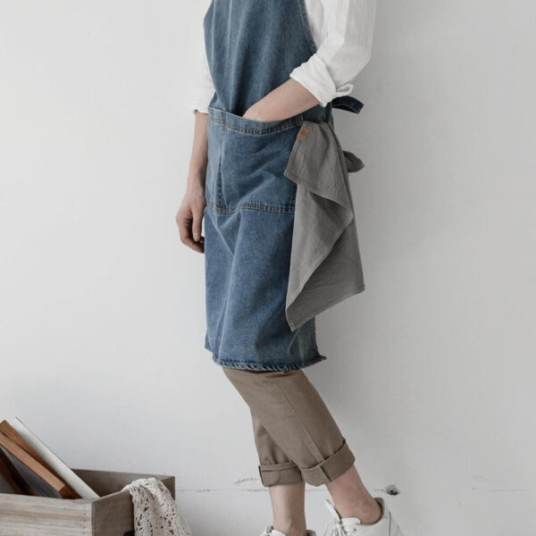 Vintage denim barista apron side view with model