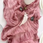 blush pink boho polyester table runner crinkled texture close-up