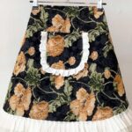 black vintage floral half apron with lace trim