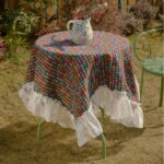 american floral table runner with multicolor tassel pattern and lace trim