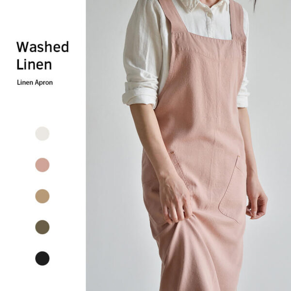 Blush pink cotton linen gardening apron worn by model, front view