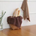 Cotton linen blend placemats styled with bread and greenery for food photography