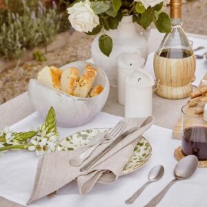 natural linen cocktail napkins set on outdoor dining table