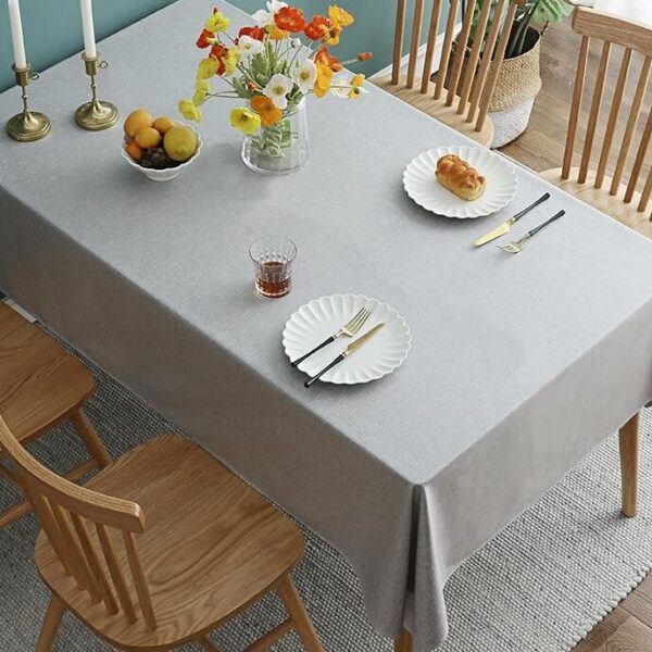 stain resistant tablecloths Waterproof, light gray cotton linen waterproof tablecloth, farmhouse dining table decor with flower arrangement