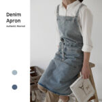 Vintage denim barista apron worn by a model in a kitchen setting