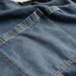 Vintage denim barista apron fabric and pocket detail