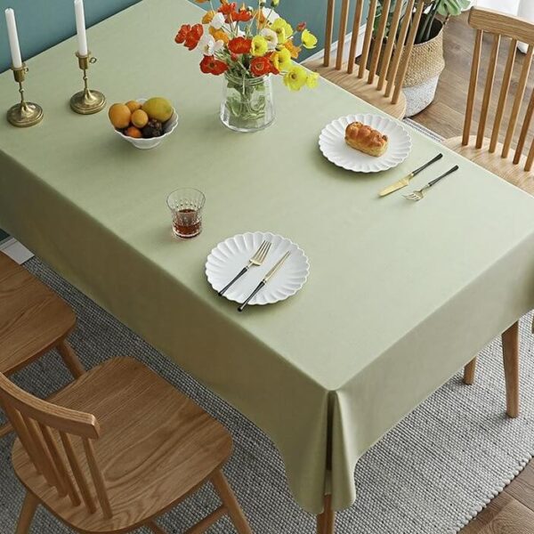 stain resistant tablecloths Waterproof, light green cotton linen waterproof tablecloth, farmhouse dining table setting with flowers and tableware
