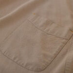 Close-up of washed cotton linen fabric texture for gardening apron