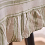 Green Farmhouse Ruffled Striped Tablecloth Fabric Close Up, Vintage Linen Blend Ruffle Edge Detail, Machine Washable Dining Cover