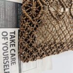 Close Up Dark Brown Hollow Diamond Knit Straw Bag Weave Texture Detail