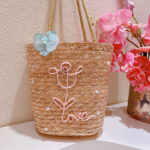 Brown Woven Straw Tote Bag with Light Blue Orchid Flower Applique