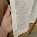 Rustic Linen Cafe Curtain fabric close-up shot, natural faux linen grain texture, semi sheer soft sheer material detail for farmhouse half window curtain