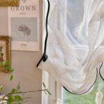 French Linen Cafe Curtain wall decor matching shot, vintage cream pull up sheer window shade, black edge trim, farmhouse cottage interior style