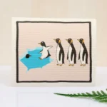 organic cotton kitchen towels with diving penguin cartoon print, reusable dish drying towel for café and home kitchen