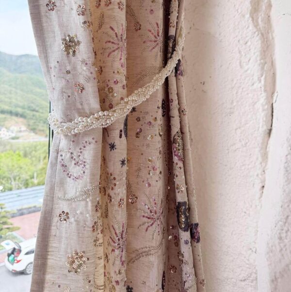 botanical print curtain panel tied back with fabric tieback, beige vintage floral window drapery with gathered side detail
