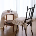 beige farmhouse dining chair seat cover with frilled edge, decorative cover for chair seat in French country dining room