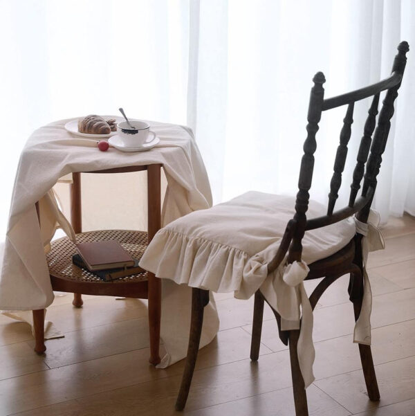 beige farmhouse dining chair seat cover with frilled edge, decorative cover for chair seat in French country dining room