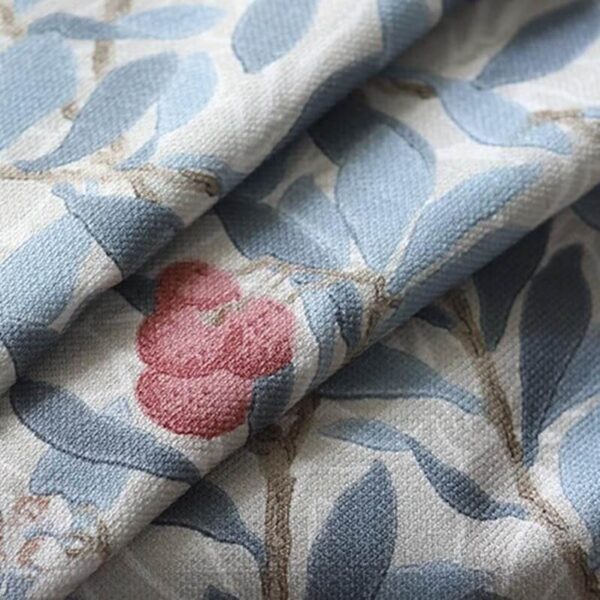 folded cottage blackout curtain panel detail, soft cotton blend fabric with blue leaf and red berry print