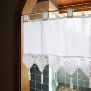 white cotton linen‑look tie‑top valance with heart lace tassels above kitchen sink window