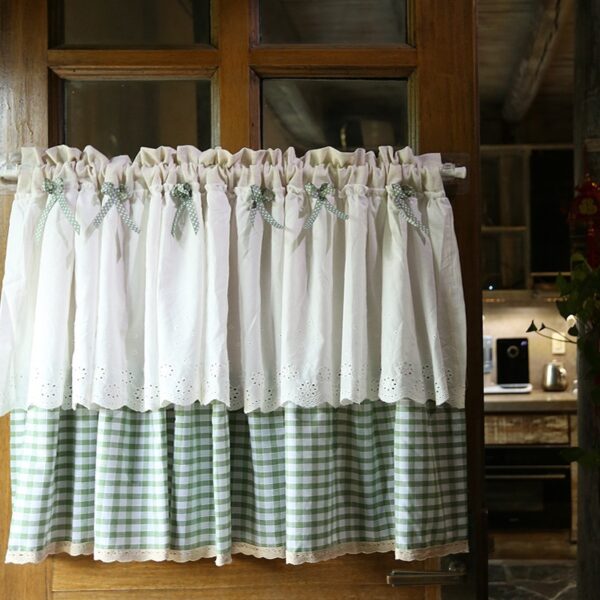 Bow‑decorated short cafe curtain fitted on home kitchen window