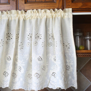 White floral short curtain ruffled rod‑pocket tier curtain hung on kitchen window