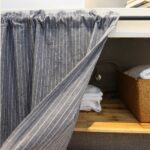 Grey vertical‑striped tier curtain pulled‑open display for cabinet‑door decoration