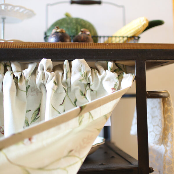 Rod‑pocket header detail of farmhouse kitchen tier curtain