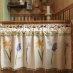 Full view of daffodil flower pattern on the bottom hem of kitchen sink curtain