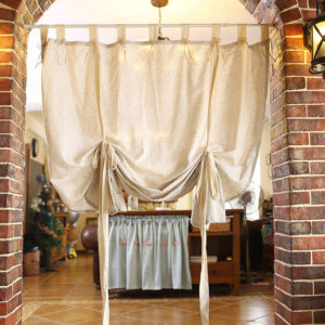 Linen blend woven curtain installed on arched doorway farmhouse home decor