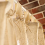 Close‑up of hidden inner lifting straps on linen blend woven curtain