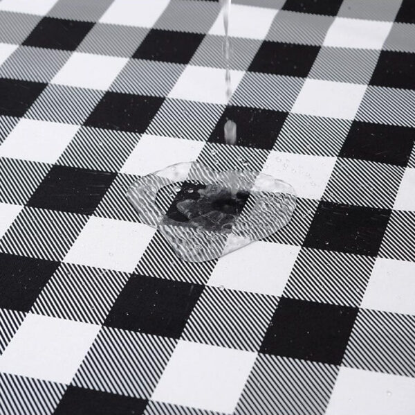 Close‑up view of durable gingham woven tablecloth texture