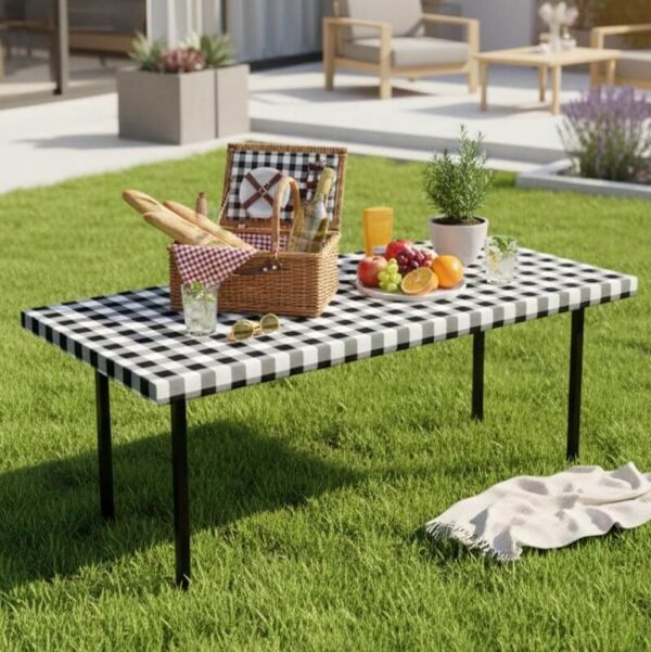 Black white gingham outdoor tablecloth with picnic basket, backyard party decor
