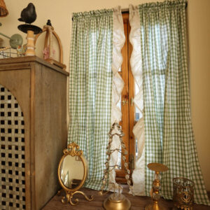 Vintage farmhouse room styled with green gingham cafe window curtain
