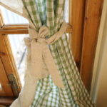 Close‑up of tie back detail for green gingham farmhouse cafe curtain