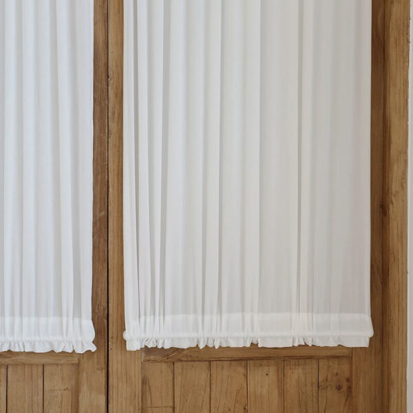 linen‑like textured surface of white dual rod pocket curtain panel