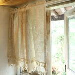 Single‑panel double layer lace short curtain hanging on kitchen window, cottage home decor