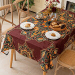 Arabesque jacquard polyester tablecloth, vintage oriental scroll pattern on rectangular dining table