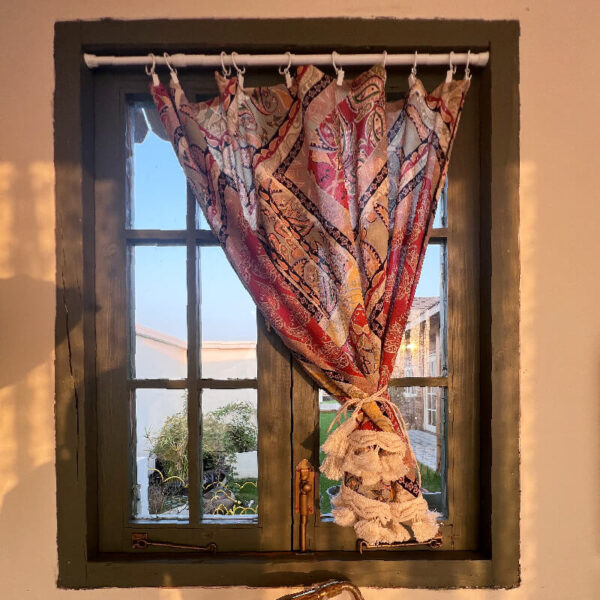 Boho Paisley Half Curtain clipped on wooden window, vibrant exotic turkish bohemian decor for accent window