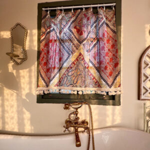 Boho Paisley Half Curtain semi‑sheer decorative curtain, warm sunlight filters through vibrant paisley print tassel curtain