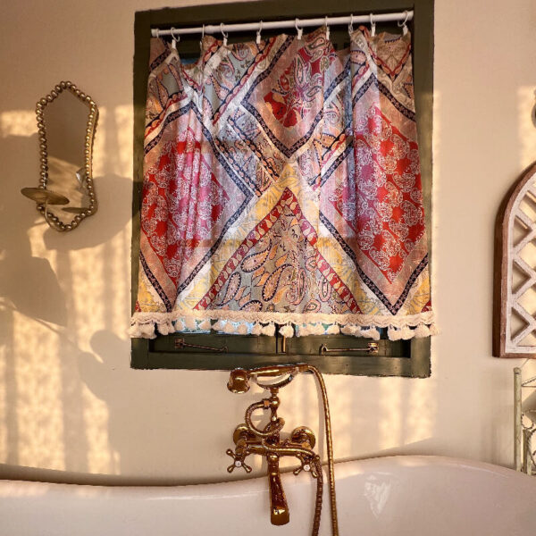 Boho Paisley Half Curtain semi‑sheer decorative curtain, warm sunlight filters through vibrant paisley print tassel curtain