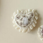 cute lace applique fabric back side view, heart‑shaped lace fabric patches