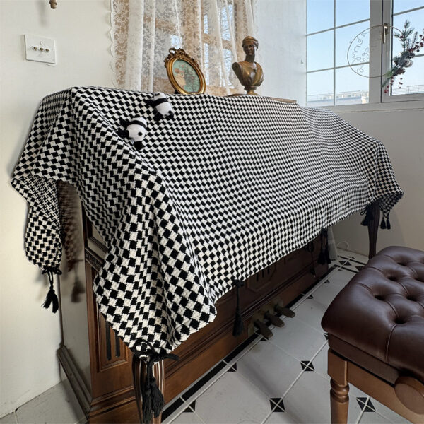 Upright piano cover cloth, black‑white diamond‑check dust cloth with cute panda ornaments and black tassel fringe on wooden upright piano