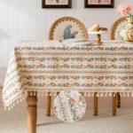 Vintage cottage dining decor with rectangular row‑floral tassel trim tablecloth