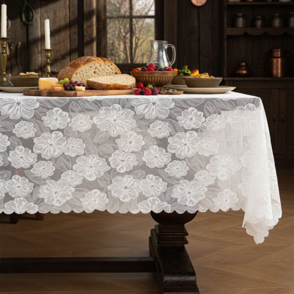 White camellia rectangular tablecloth with wavy scalloped edge on dining table