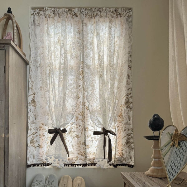 vintage cottage rod pocket doorway curtain bird print hanging over doorway opening