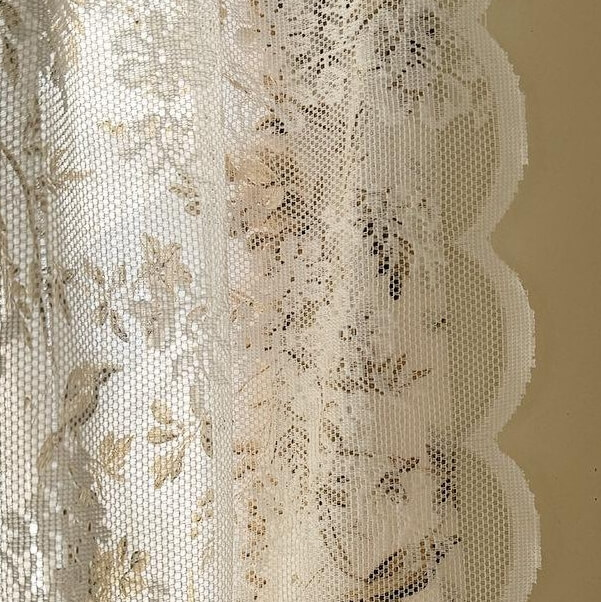 closeup of bird print lace fabric for rod pocket doorway curtain cottage decor