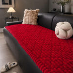 Vibrant red plush sofa throw cover, textured quilted sofa protector for home decoration